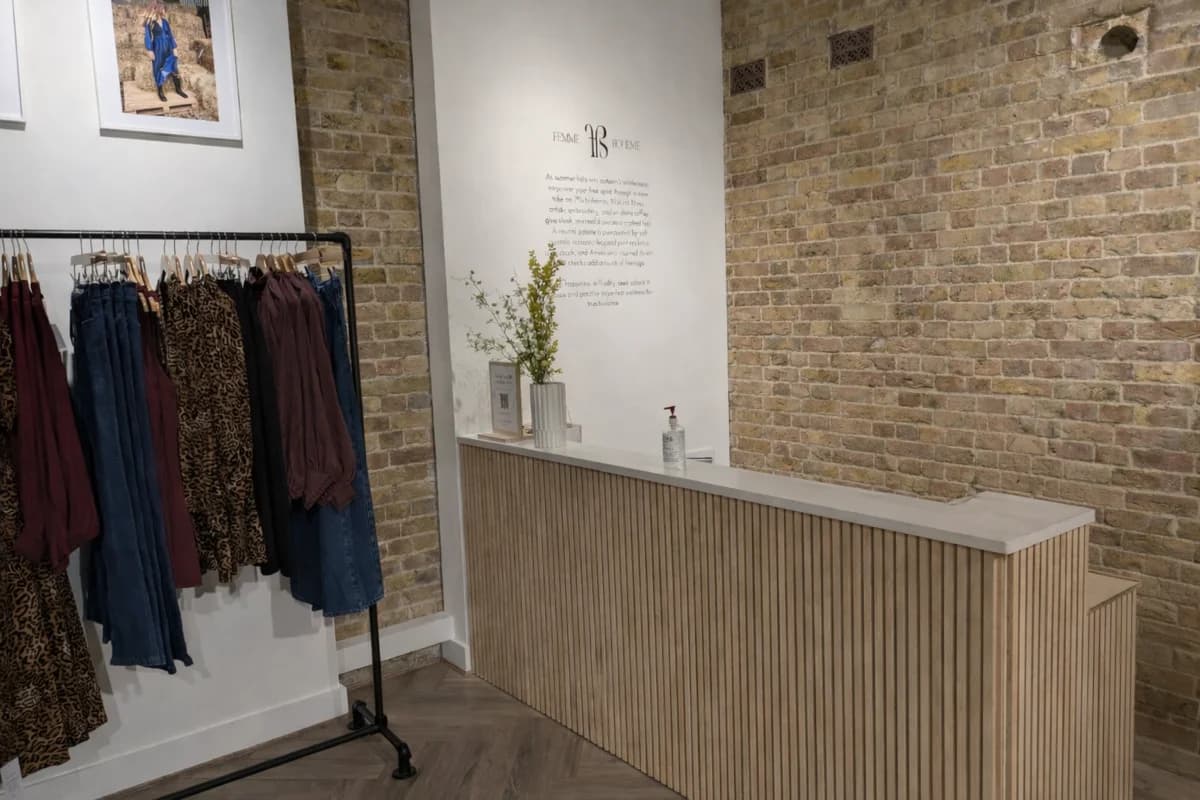 Custom birch wood retail desk by CVB Technical Solutions